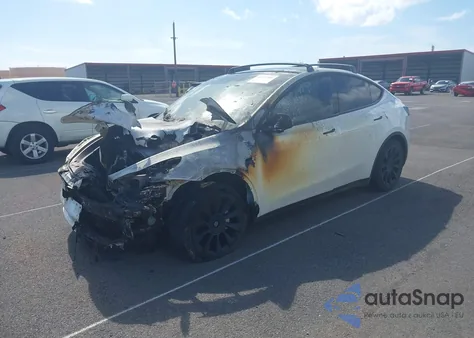 2021 Tesla Model Y Standard Range Rear-Wheel Drive from USA, damaged, VIN 5YJYGDEDXMF103483